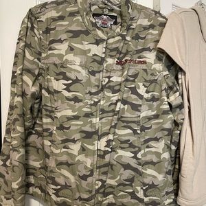 Camouflage jacket with removable solid tan vest with hoodie; two looks in one